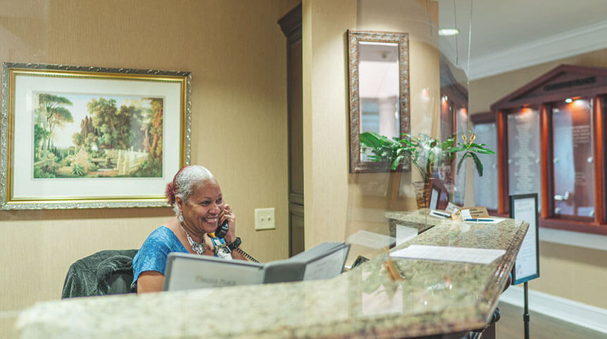 Women at desk on phone